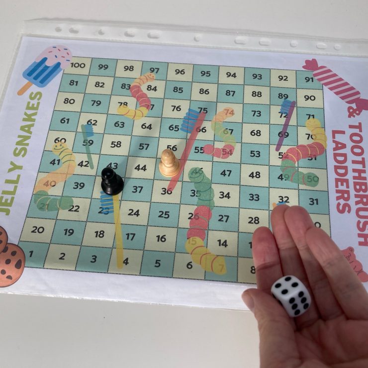 A board game like the classic snakes and ladders where the snakes are made of jelly and the ladders are toothbrushes.